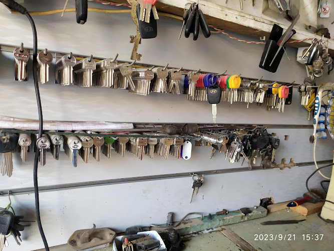 Abu Maryam for lock repair and making all types of keys, renowned for his work with Mohamed Mesmar, Osaim, Giza
