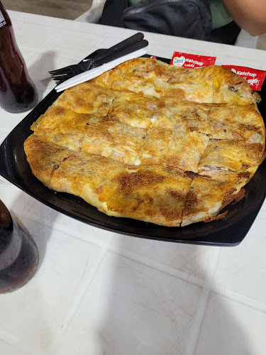 Feteer and Al-Husseini Pizza