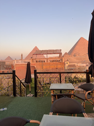 Karnak House pyramids view